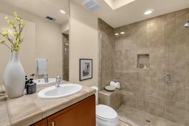 a bedroom with bed and furniture