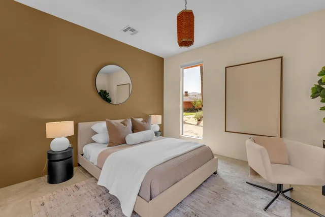 a view of a swimming pool and lounge chair