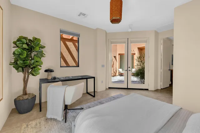 a outdoor living space with furniture and a potted plant