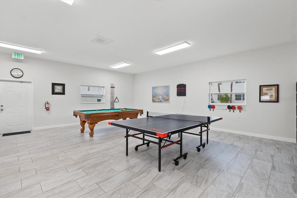 1531 Placida Road, Unit 204 Englewood, FL 34223 - Photo 31 of 47 a room with furniture pool table and table soccer