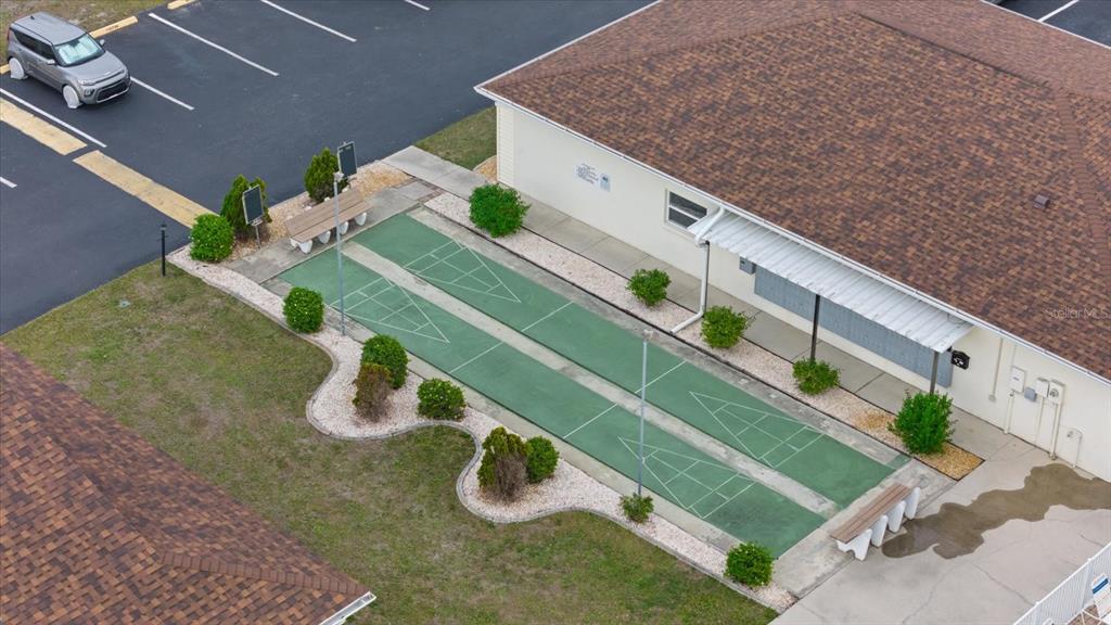 1531 Placida Road, Unit 204 Englewood, FL 34223 - Photo 41 of 47 a green field with plants