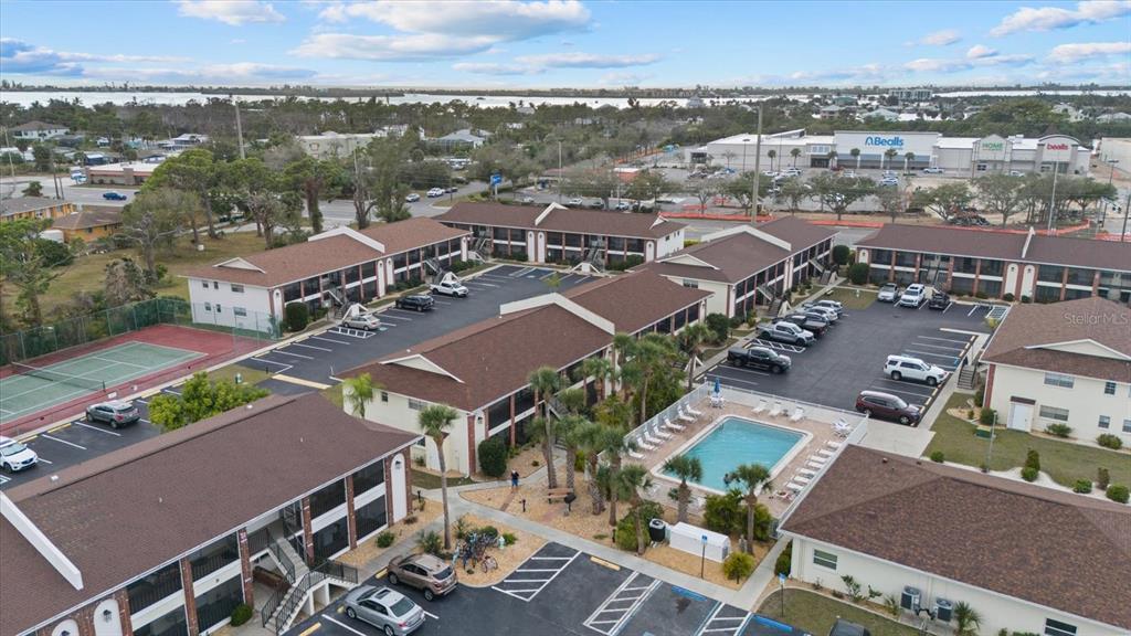 1531 Placida Road, Unit 204 Englewood, FL 34223 - Photo 47 of 47 an aerial view of residential houses with outdoor space