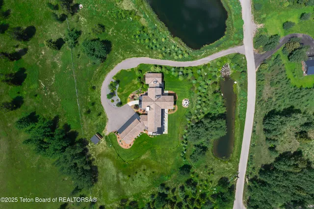 $12,900,000 | 5060 Eagle Road, Wilson, WY 83014