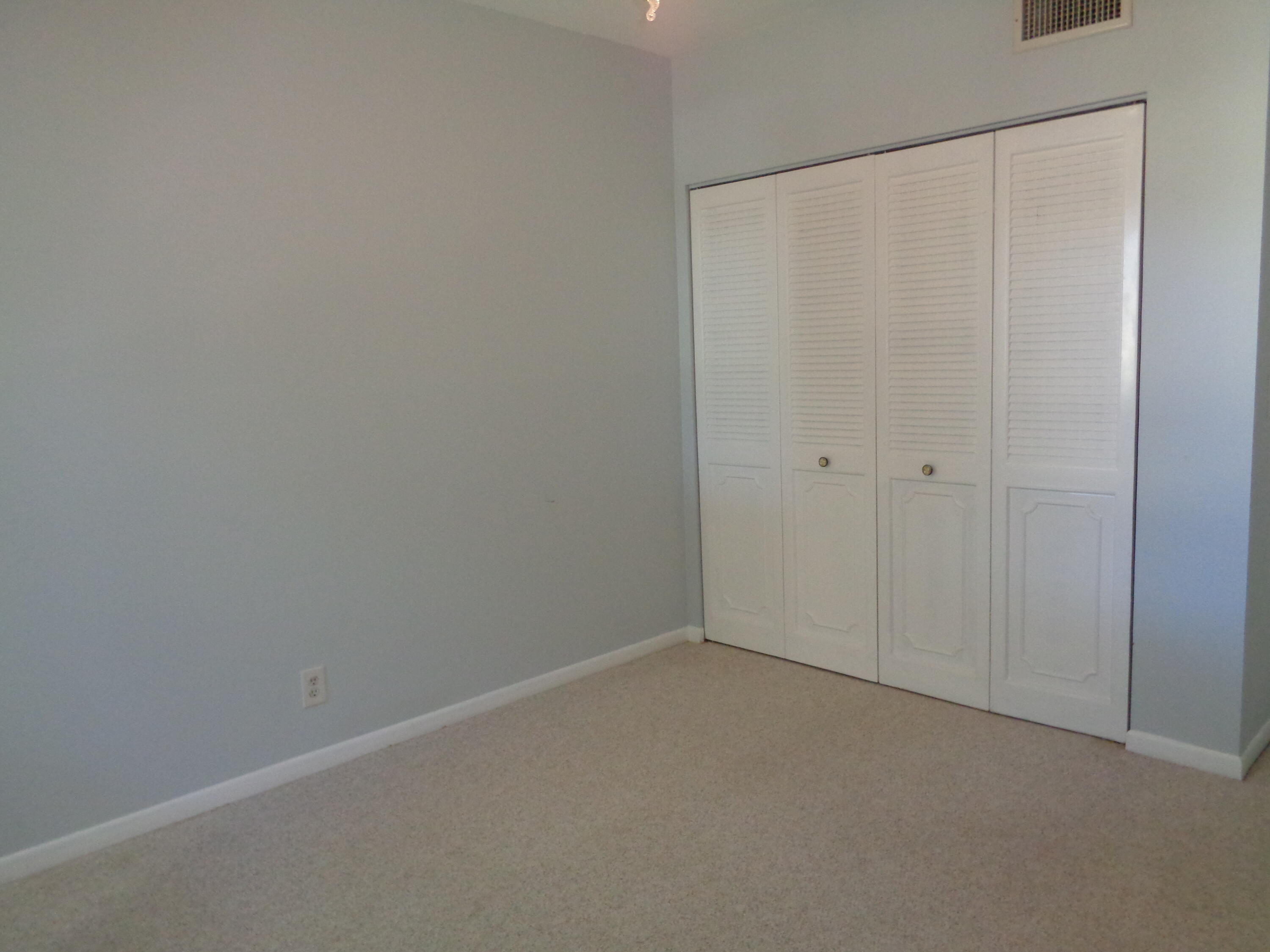 6328 Longboat Lane West, Unit 201 Boca Raton, FL 33433 - Photo 12 of 17 6328 Longboat Bedroom 2 Closet