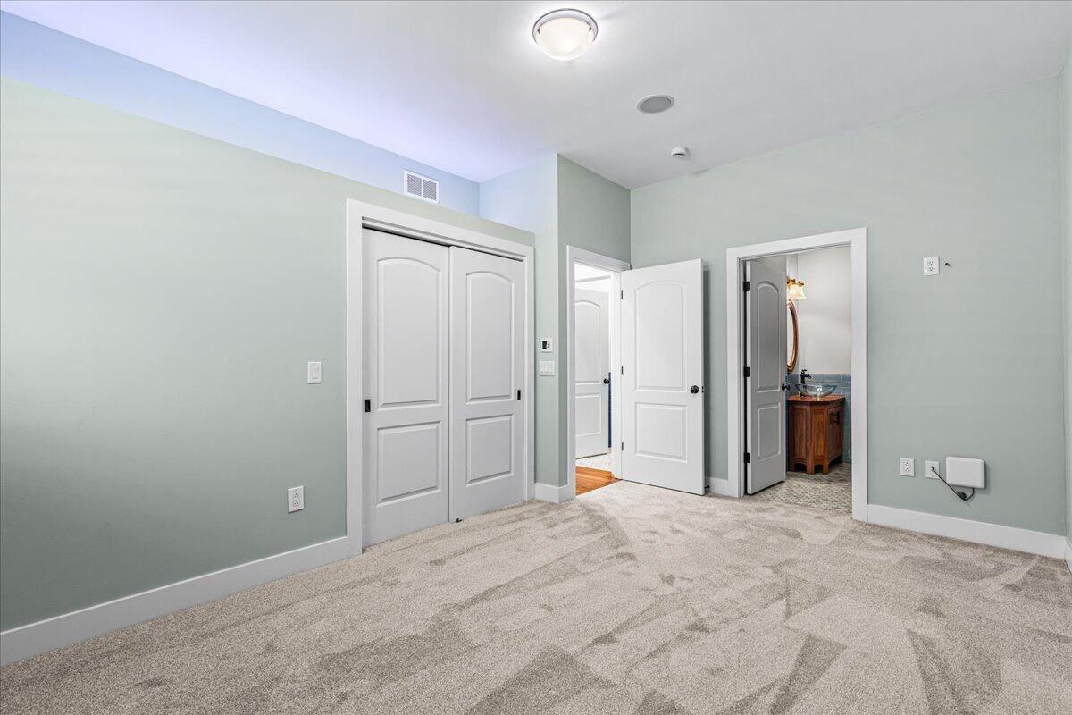 4763 Fontana Beach Road, Unit 4762 Polk, WI 53086 - Photo 32 of 100 Main Level Bedroom #2