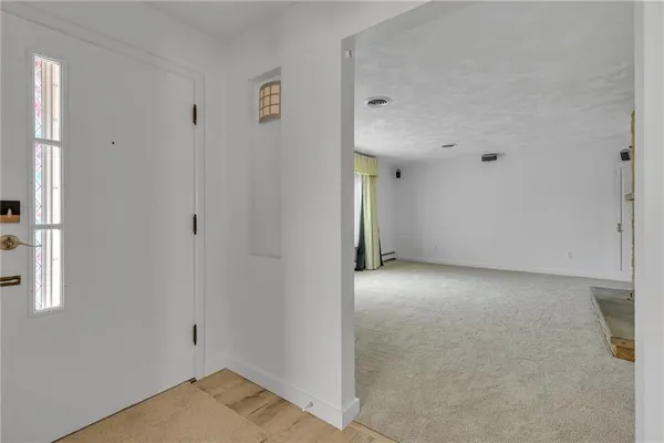 a view of a room with wooden racks
