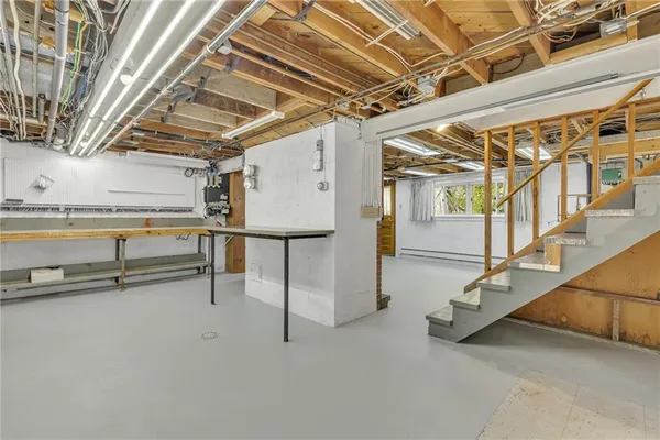 a view of a garage with wooden floor