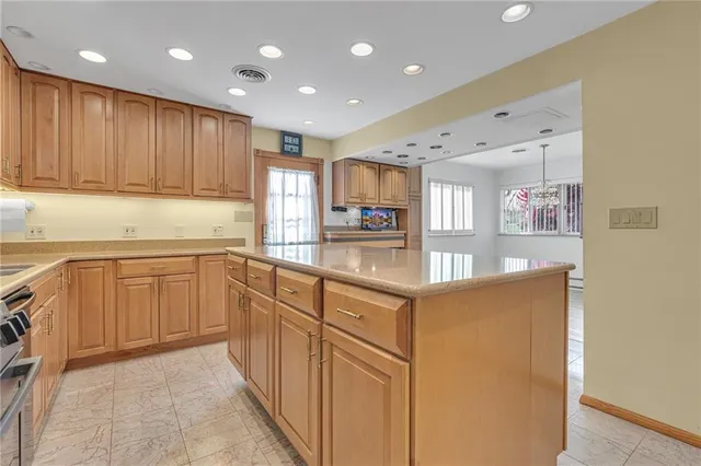 a view of an empty room with a fireplace