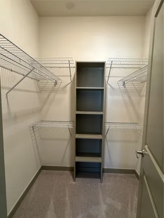 a bathroom with a glass door shower