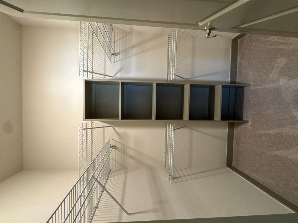 691 Union Chapel Road, Unit B2 Cedar Creek, TX 78612 - Photo 13 of 26 Spacious closet with carpet