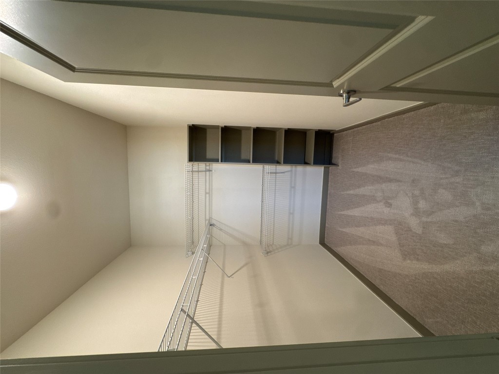 691 Union Chapel Road, Unit B2 Cedar Creek, TX 78612 - Photo 5 of 26 Walk in closet with carpet