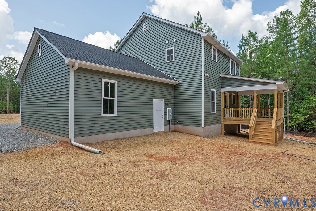 3844 Maidens Road Powhatan, VA 23139 - Photo 44 of 49 Back of property featuring a shingled roof and sta