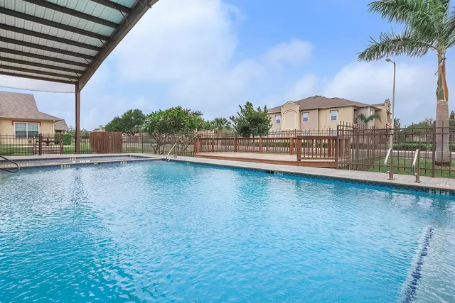 a view of a lake with a house