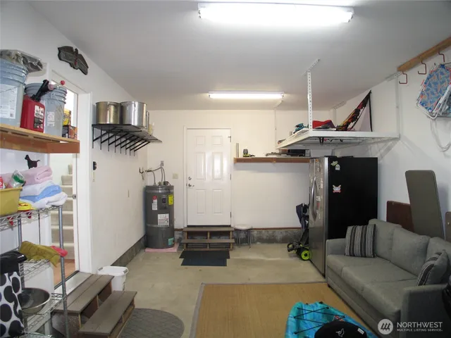 an aerial view of a house with swimming pool and outdoor space