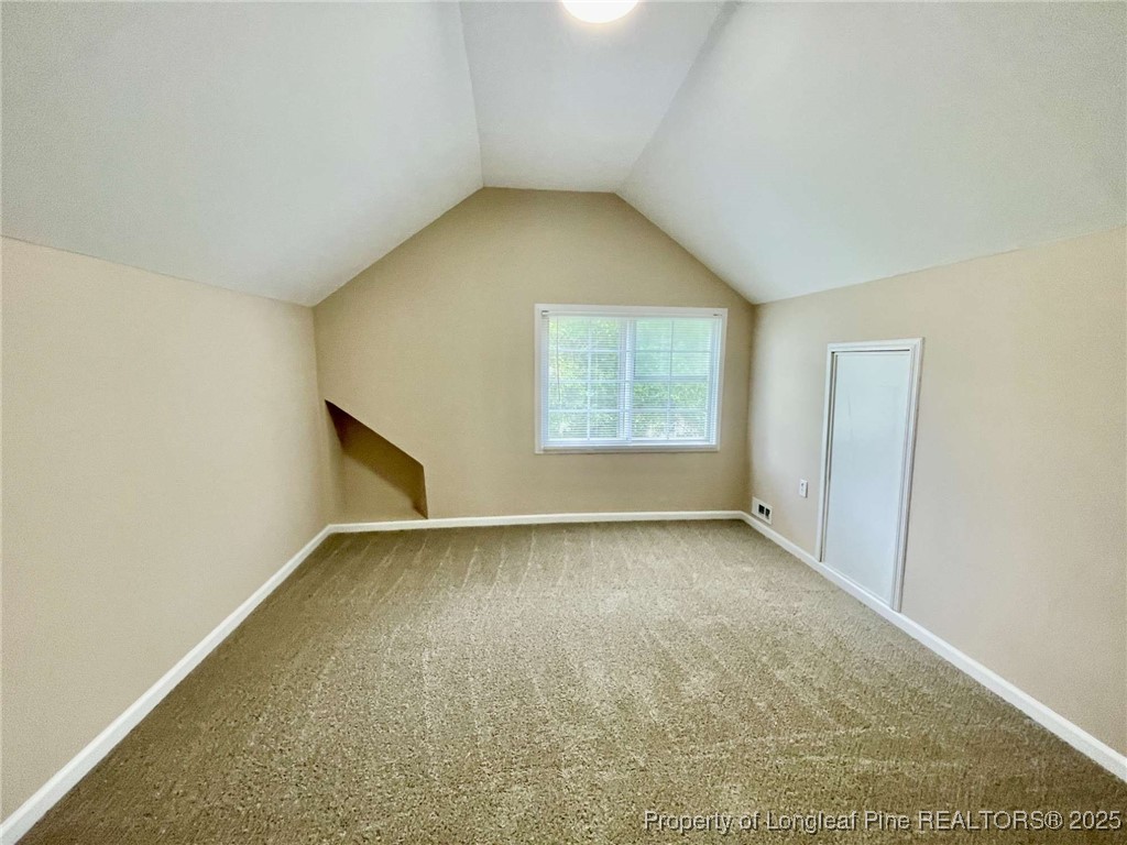 416 Old Maxton Road Raeford, NC 28376 - Photo 12 of 26 an empty room with a empty space and windows