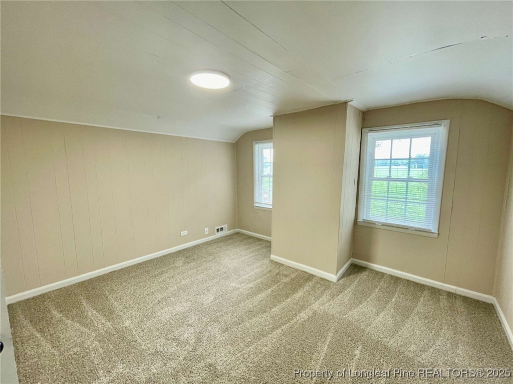 416 Old Maxton Road Raeford, NC 28376 - Photo 9 of 26 a view of an empty room with a window