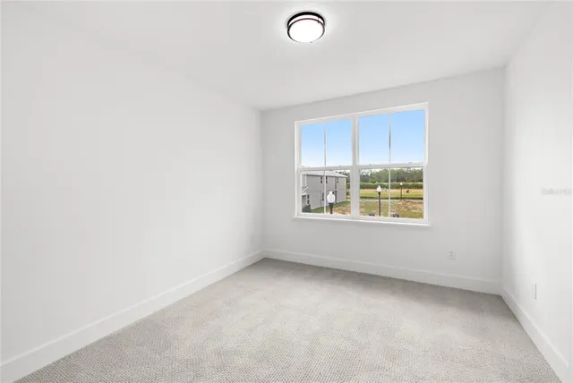 an empty room with a window