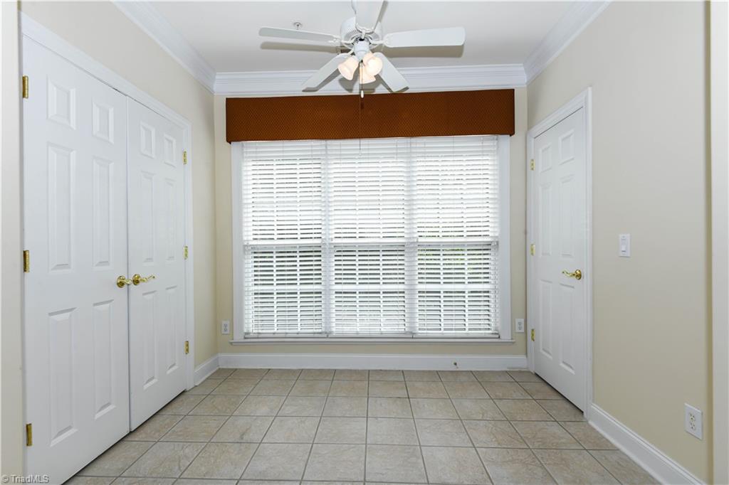 522 College Road Greensboro, NC 27410 - Photo 12 of 36 Great space for a comfortable chair to relax and/or a space that your plants would enjoy.