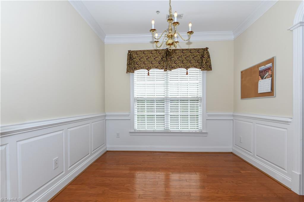 522 College Road Greensboro, NC 27410 - Photo 13 of 36 A great light filled space for mealtime gatherings.