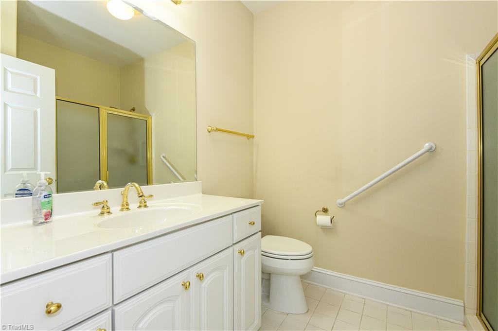 522 College Road Greensboro, NC 27410 - Photo 21 of 36 Primary Bath - 36" vanity along with a grab bar