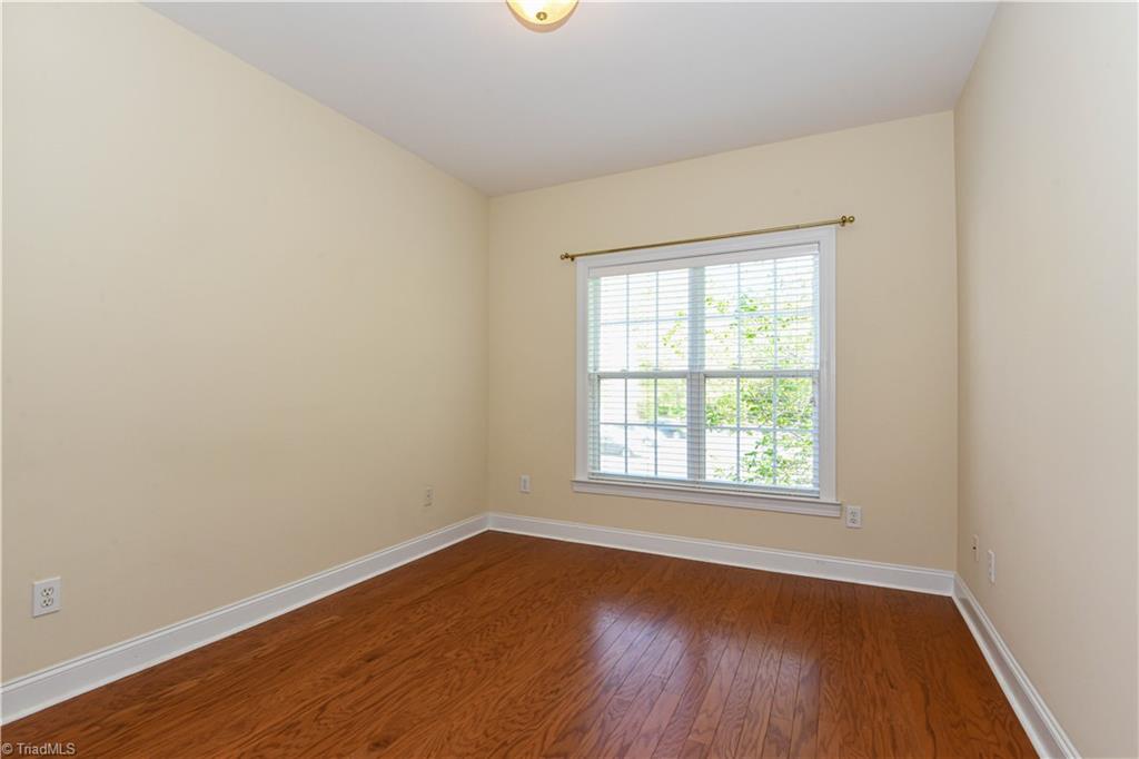 522 College Road Greensboro, NC 27410 - Photo 23 of 36 Bedroom 2. The wall space makes it easy to place furniture.