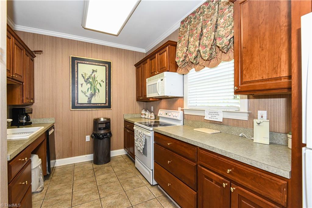 522 College Road Greensboro, NC 27410 - Photo 31 of 36 The kitchen is well equipped