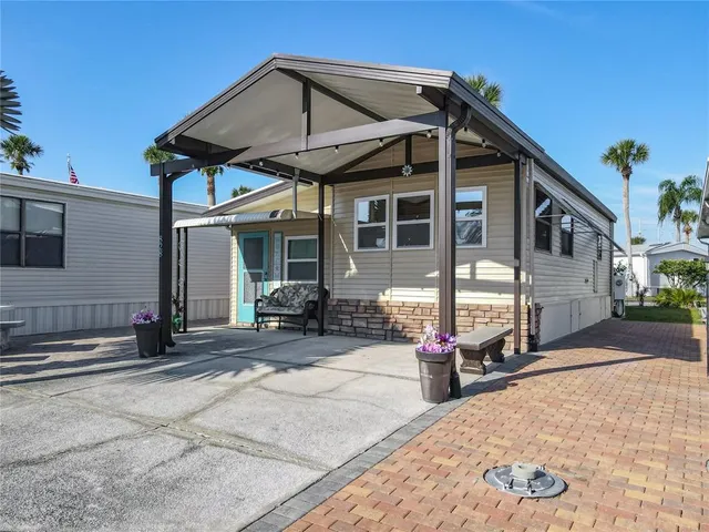 a view of a building with sitting area