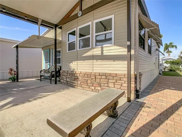 an aerial view of a houses with outdoor space