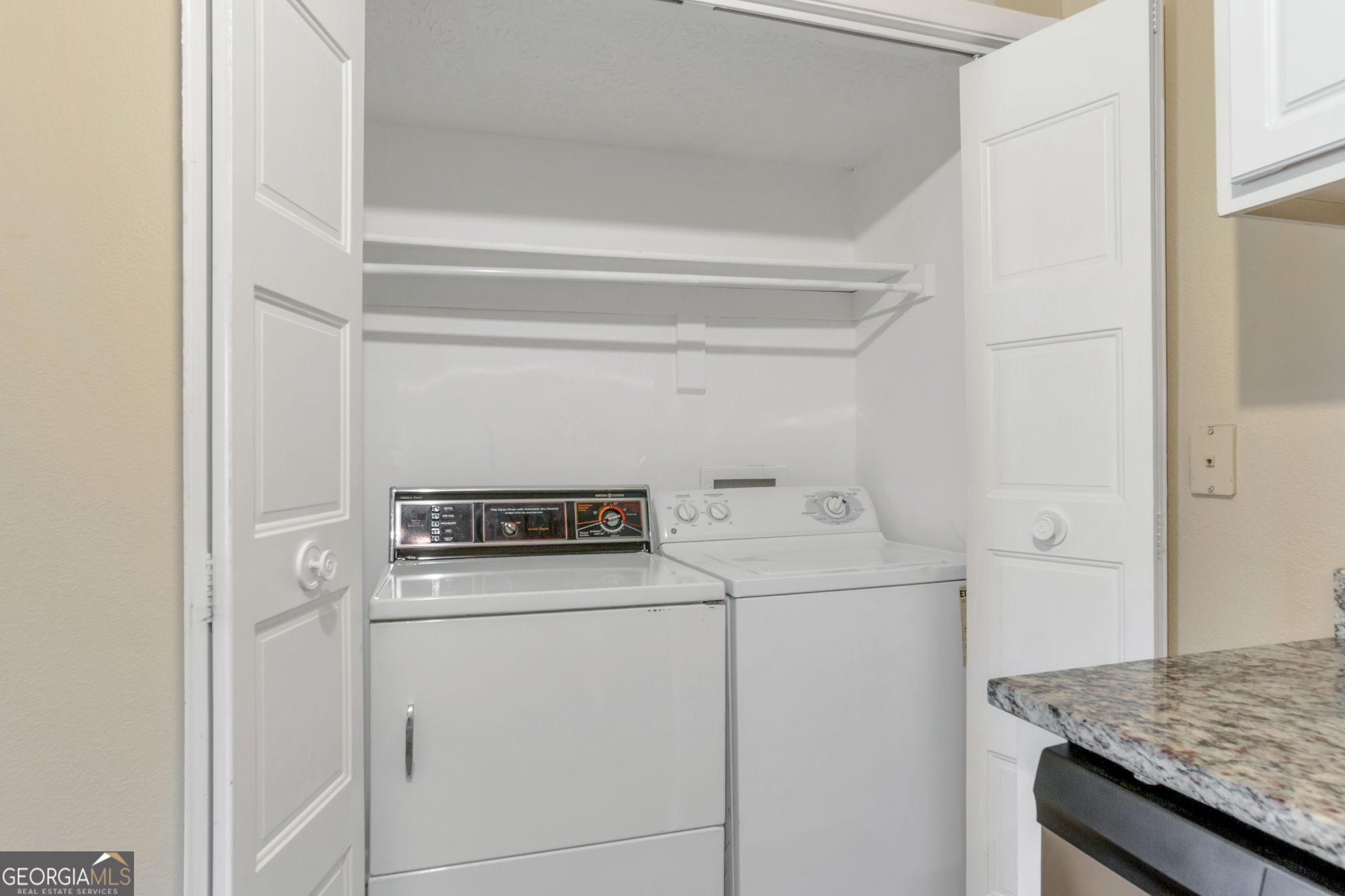 5155 Roswell Road, Unit 9 Atlanta, GA 30342 - Photo 11 of 20 a utility room with dryer and washer