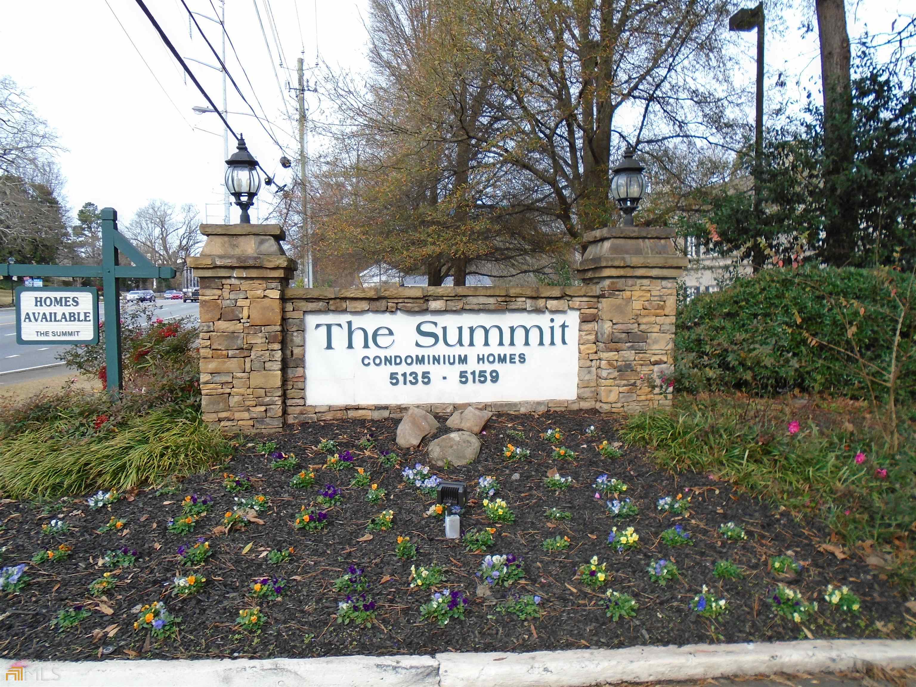 5155 Roswell Road, Unit 9 Atlanta, GA 30342 - Photo 20 of 20 a sign on the side of a road