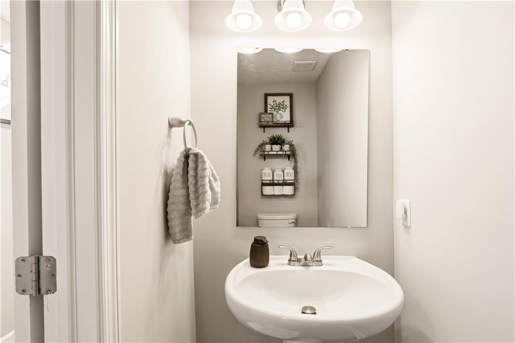3106 Upper Ridgeview Road Connellsville, PA 15425 - Photo 17 of 44 a bathroom with a sink and a mirror