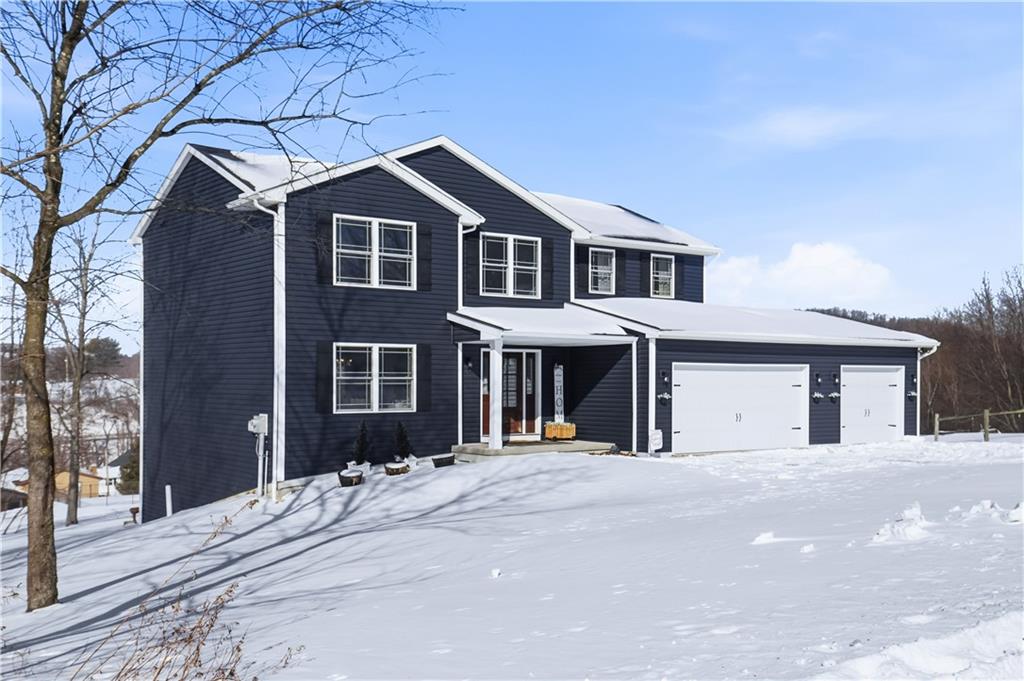3106 Upper Ridgeview Road Connellsville, PA 15425 - Photo 2 of 44 a front view of a house with a yard