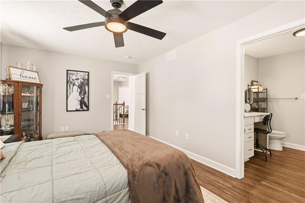 3106 Upper Ridgeview Road Connellsville, PA 15425 - Photo 32 of 44 a bedroom with a bed and a chandelier