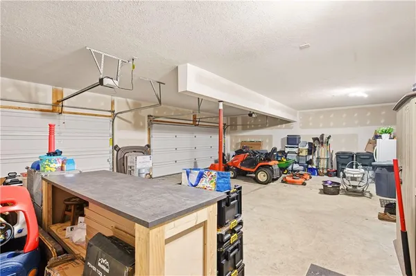a gym room with lots of gym equipment