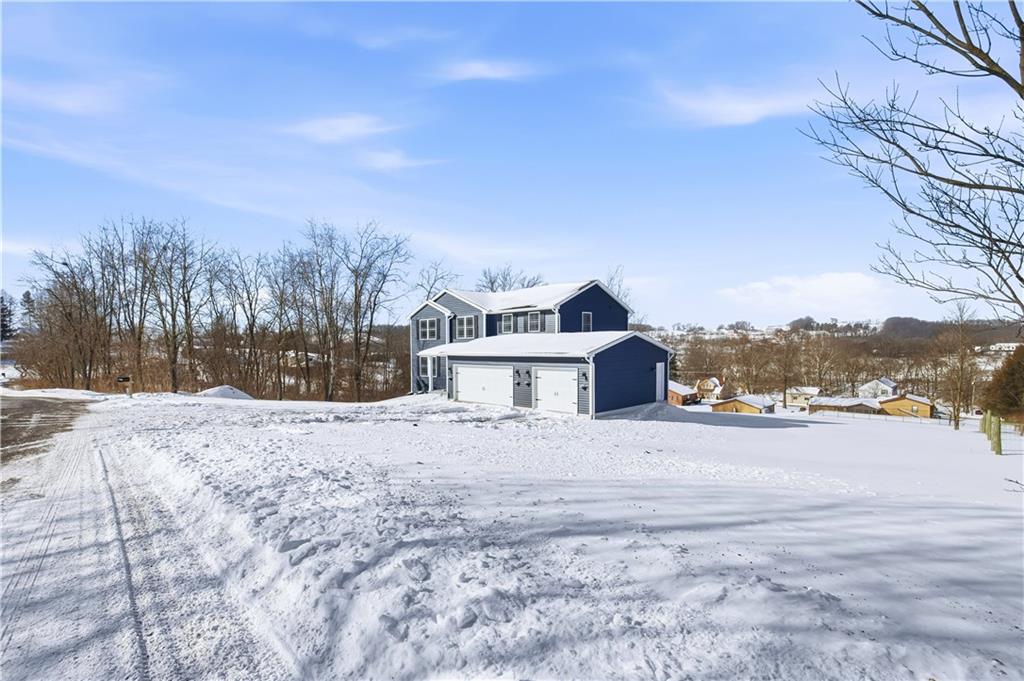 3106 Upper Ridgeview Road Connellsville, PA 15425 - Photo 38 of 44 a view of a house with a yard covered in snow