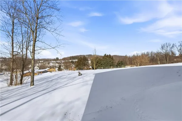 a view of a house with a snow