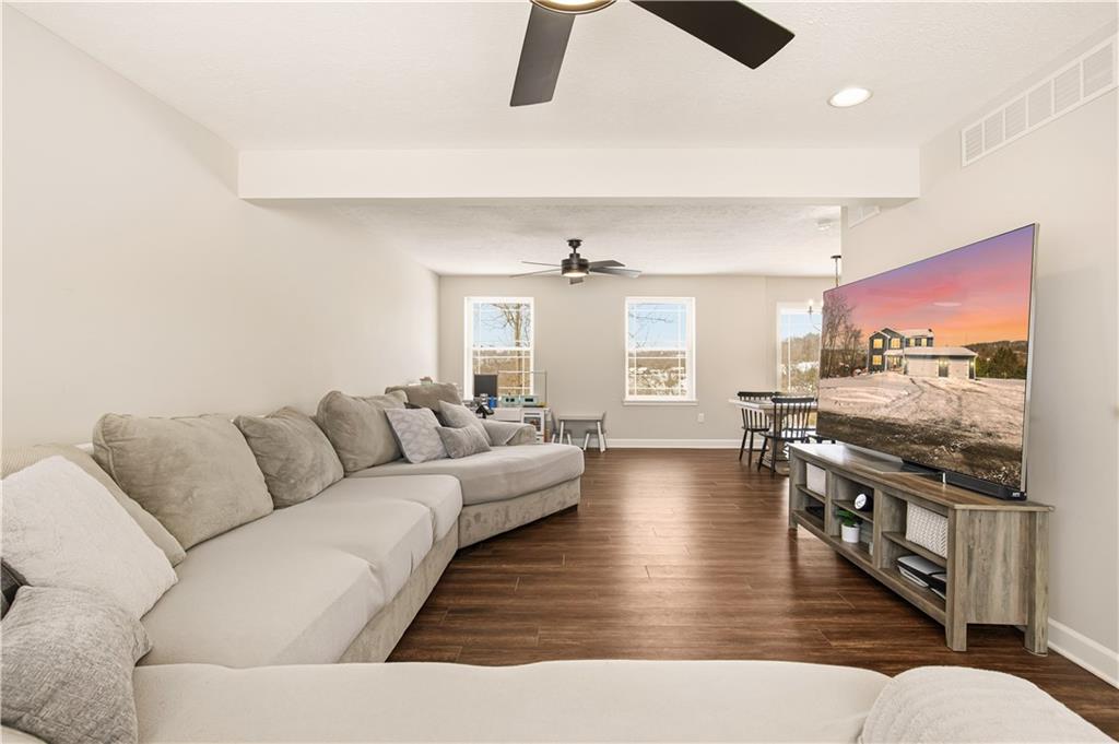 3106 Upper Ridgeview Road Connellsville, PA 15425 - Photo 7 of 44 a living room with furniture and a flat screen tv