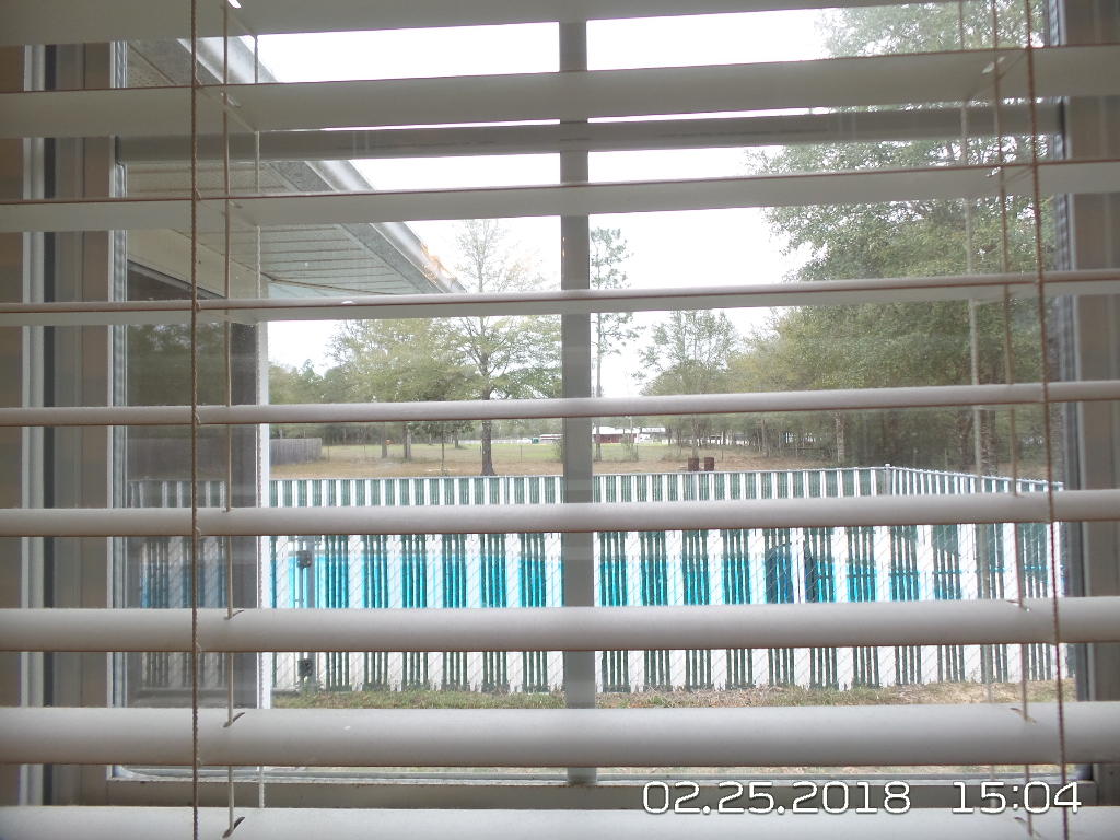 3807 Poverty Creek Road Crestview, FL 32539 - Photo 14 of 27 a picture of a bench