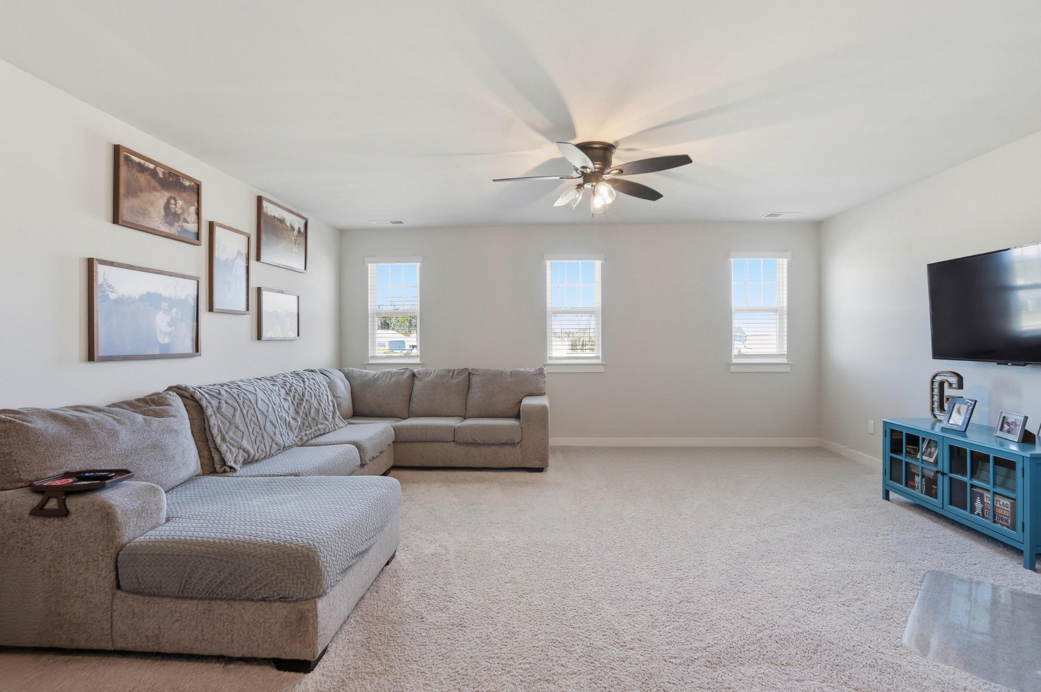 129 Merion Way Lebanon, TN 37087 - Photo 21 of 38 a living room with furniture and a flat screen tv