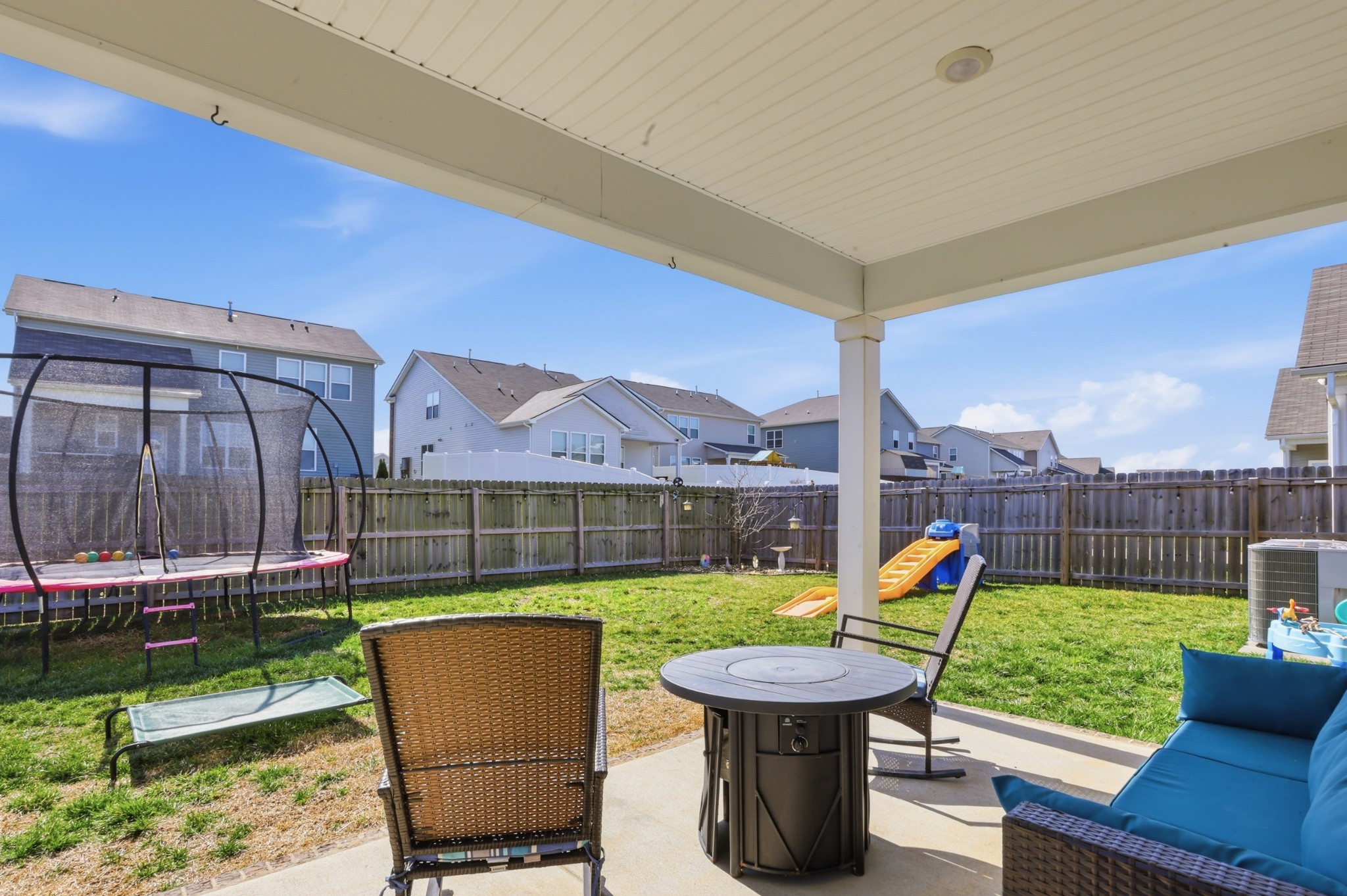 129 Merion Way Lebanon, TN 37087 - Photo 24 of 38 a view of a chairs and table in patio with a yard