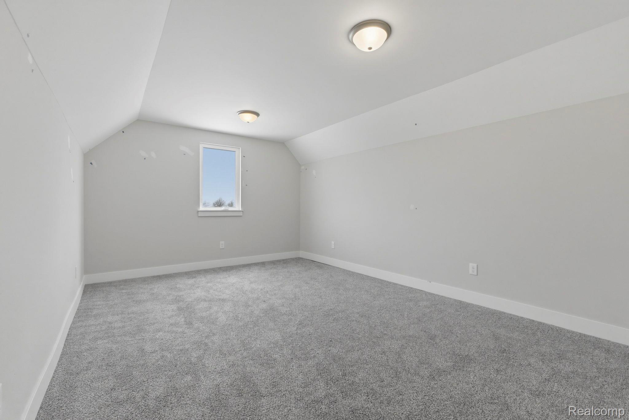 2361 Baltimore Davison, MI 48423 - Photo 18 of 31 Bonus room featuring carpet and baseboards