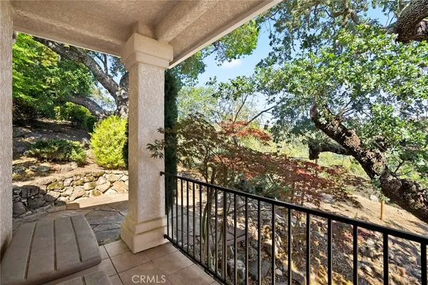 a backyard of a house with yard and outdoor seating