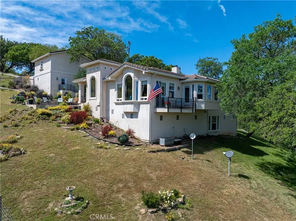 a view of a kitchen with workspace and a window