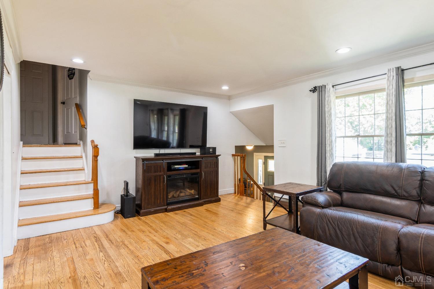 141 Overbrook Road Piscataway, NJ 08854 - Photo 11 of 38 a bedroom with furniture and a flat screen tv