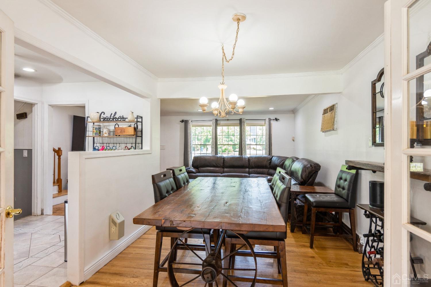 141 Overbrook Road Piscataway, NJ 08854 - Photo 13 of 38 a view of a dining room with furniture window and wooden floor