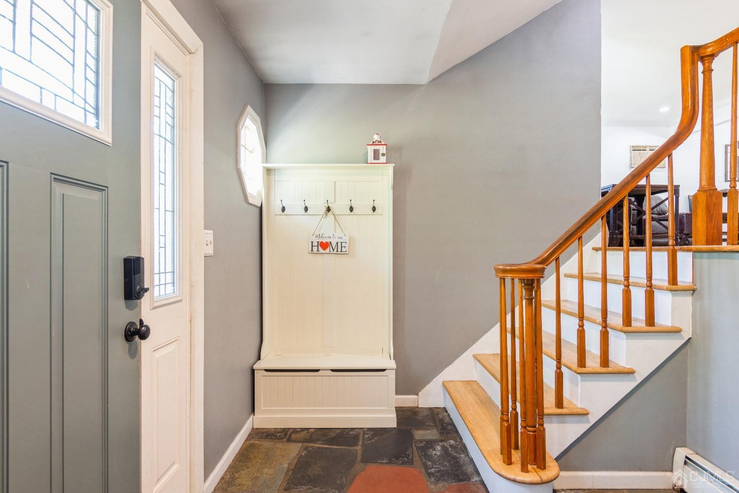 141 Overbrook Road Piscataway, NJ 08854 - Photo 15 of 38 a utility room with wooden floor and stairs