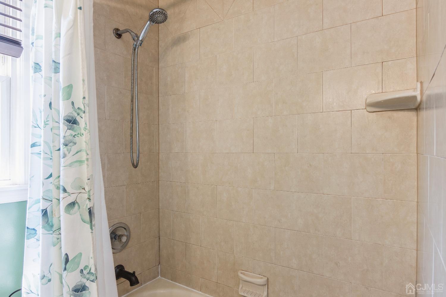 141 Overbrook Road Piscataway, NJ 08854 - Photo 23 of 38 a bathroom with a shower and toilet