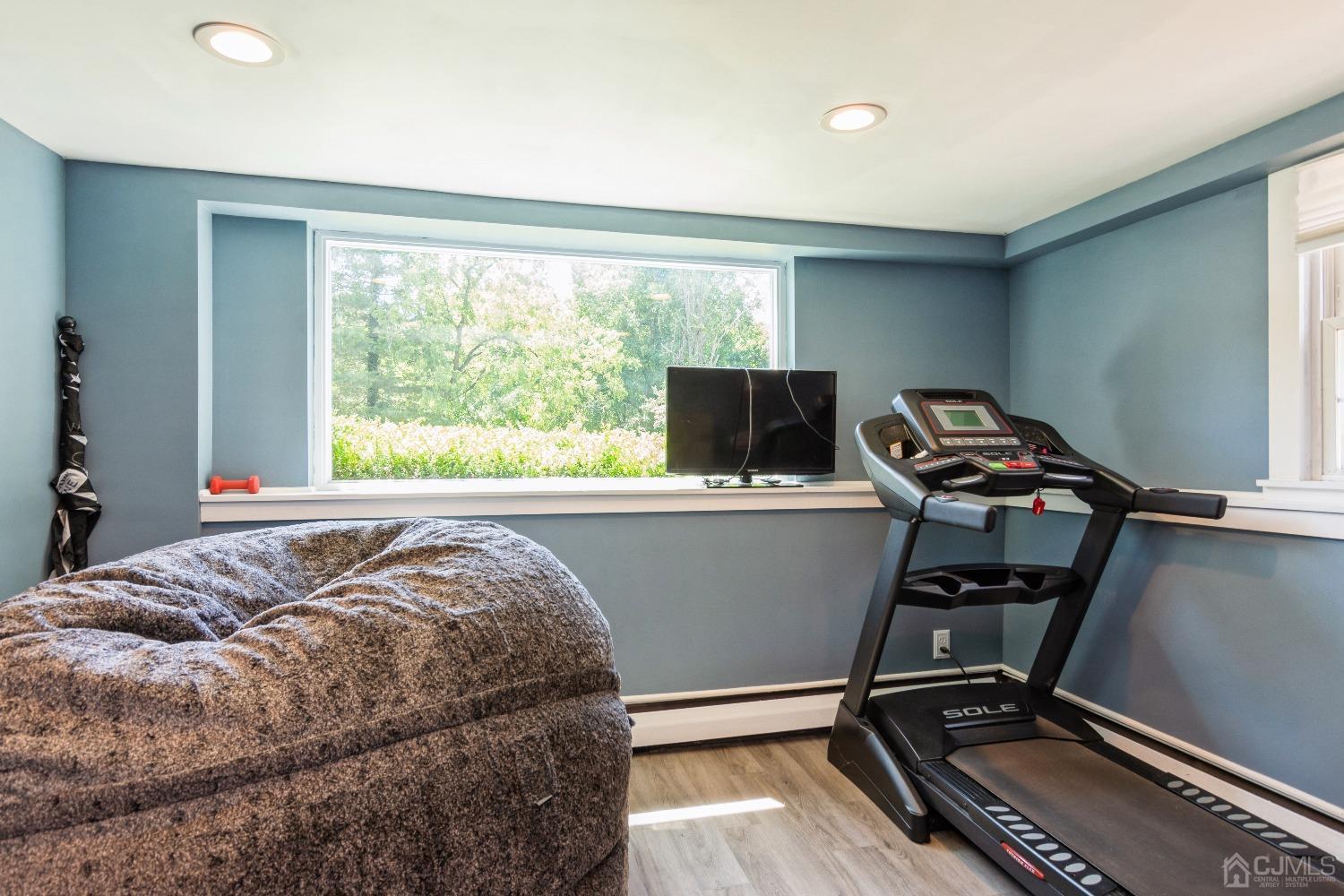 141 Overbrook Road Piscataway, NJ 08854 - Photo 30 of 38 a bed sitting in a room next to a window