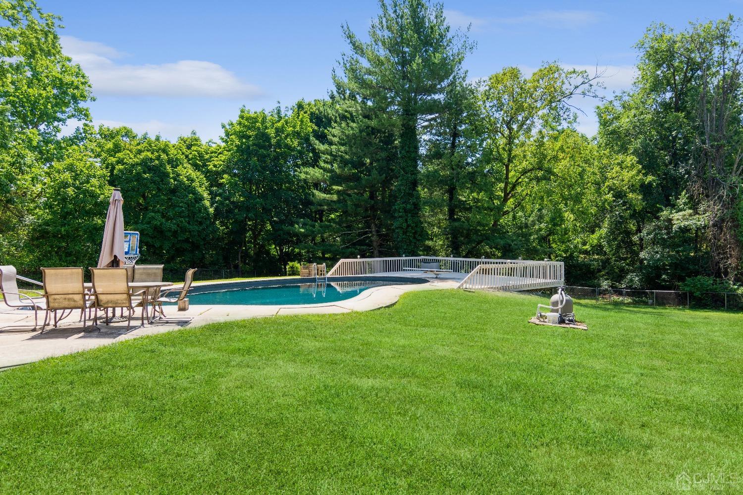 141 Overbrook Road Piscataway, NJ 08854 - Photo 3 of 38 a view of a park with a bench