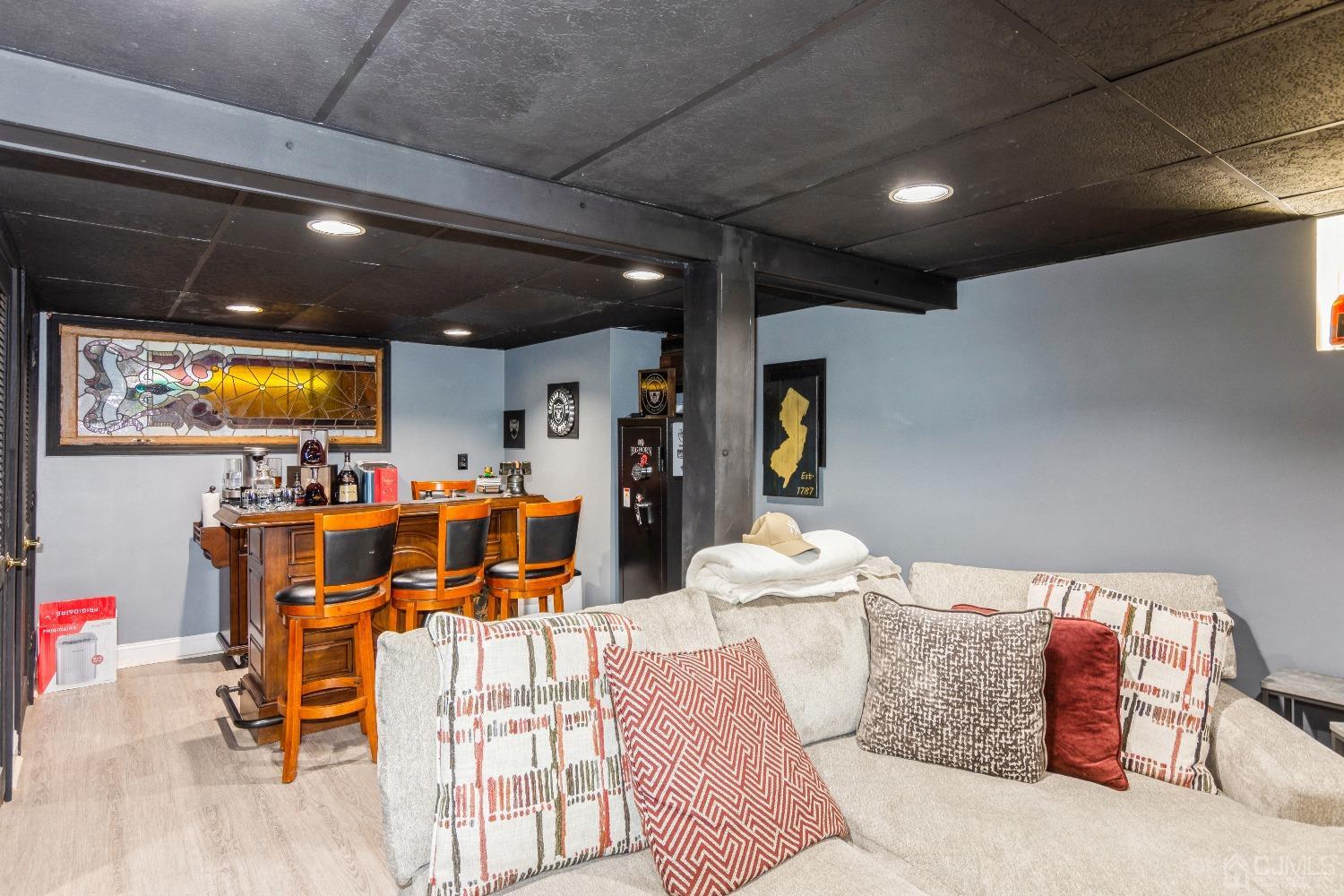 141 Overbrook Road Piscataway, NJ 08854 - Photo 35 of 38 a living room with furniture kitchen and a flat screen tv